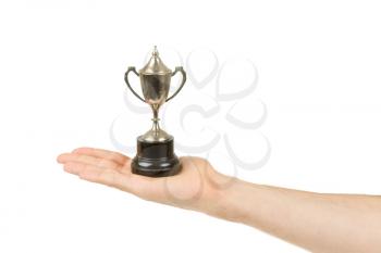 Very old trophy cup isolated on a white background