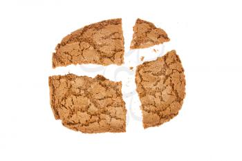 Broken speculaas biscuit, speciality from Holland, isolated on white