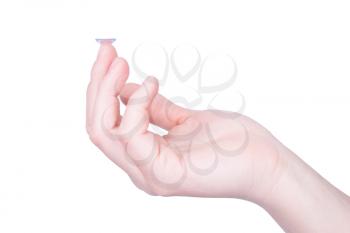 Woman holds a Contact Lens on the tip of her finger
