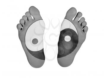 Human feet isolated on white, yin yang symbol