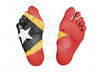Feet with flag, sleeping or death concept, flag of East Timor