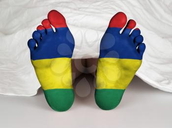Feet with flag, sleeping or death concept, flag of Mauritius