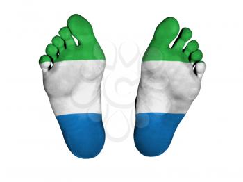 Feet with flag, sleeping or death concept, flag of Siera Leone