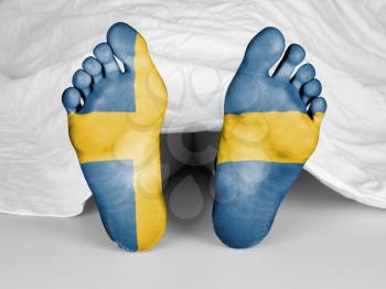 Dead body under a white sheet, flag of Sweden