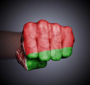 Front view of punching fist on gray background, flag of Belarus