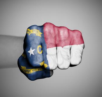 United states, fist with the flag of a state, North Carolina
