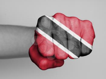 Fist of a man punching, flag of Trinidad and Tobago