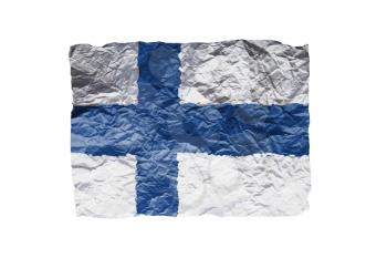 Close up of a curled paper on white background, print of the flag of Finland