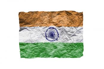 Close up of a curled paper on white background, print of the flag of India