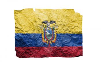 Close up of a curled paper on white background, print of the flag of Ecuador