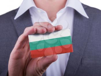 Businessman showing card, matte paper effect, Bulgaria