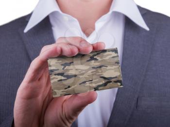 Businessman showing card, matte paper effect, camouflage