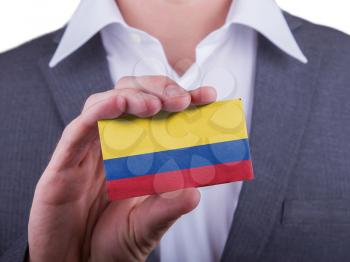 Businessman showing card, matte paper effect, Colombia