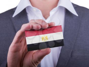 Businessman showing card, matte paper effect, Egypt