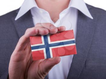 Businessman showing card, matte paper effect, Norway