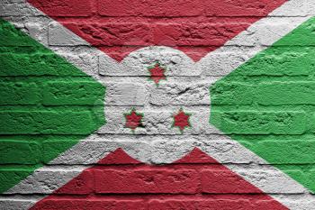 Brick wall with a painting of a flag isolated, Burundi