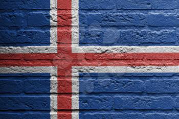 Brick wall with a painting of a flag isolated, Iceland