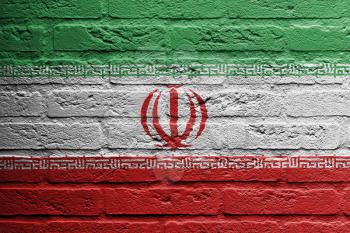 Brick wall with a painting of a flag isolated, Iran