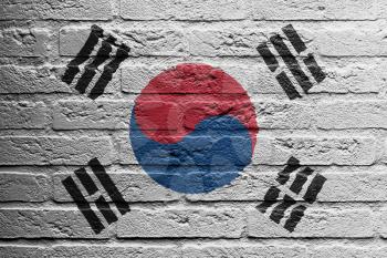 Brick wall with a painting of a flag isolated, South Korea