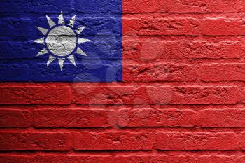 Brick wall with a painting of a flag isolated, the republic of china