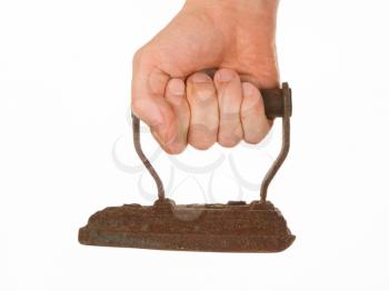 Hand holding an old iron, isolated on a white background