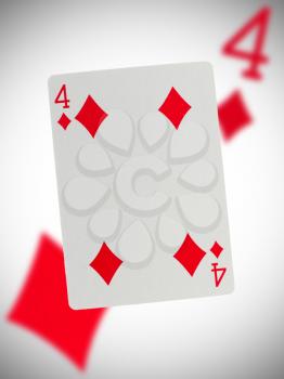 Playing card with a blurry background, four