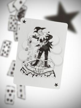 Playing card with a blurry background, black joker