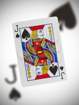 Playing card with a blurry background, jack of spades