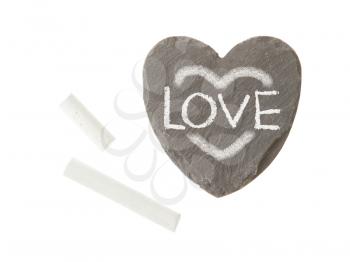 Heart shaped piece of slate over white, love