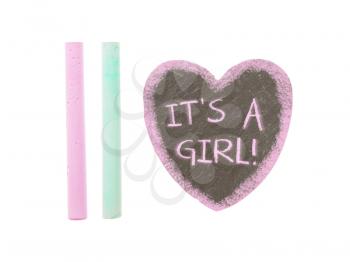 Heart shaped piece of slate over white, it's a girl
