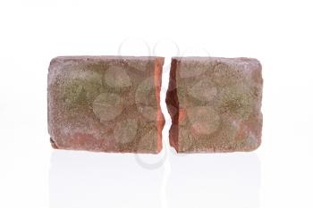 Broken brick isolated on a white background