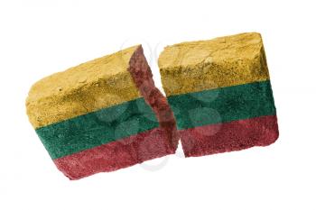 Rough broken brick, isolated on white background, flag of Lithuania