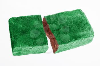 Rough broken brick, isolated on white background, flag of Lybia