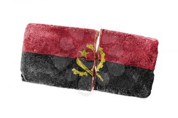 Rough broken brick, isolated on white background, flag of Angola