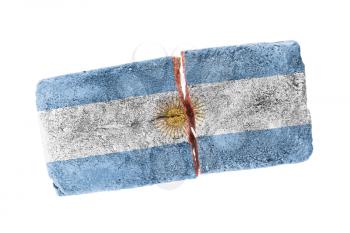 Rough broken brick, isolated on white background, flag of Argentina