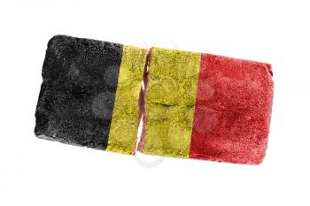 Rough broken brick, isolated on white background, flag of Belgium