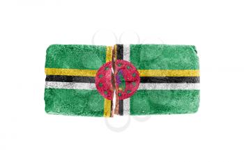 Rough broken brick, isolated on white background, flag of Dominica