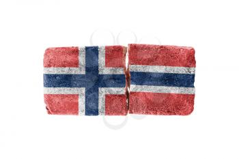 Rough broken brick, isolated on white background, flag of Norway