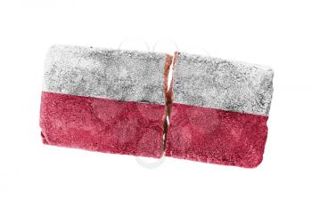 Rough broken brick, isolated on white background, flag of Poland