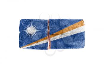Rough broken brick, isolated on white background, flag of the Marshall Islands