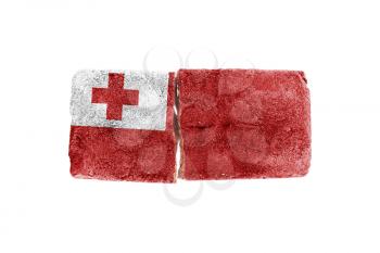 Rough broken brick, isolated on white background, flag of Tonga