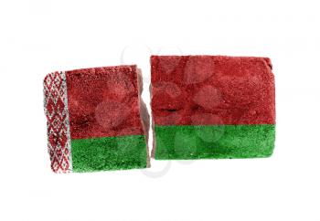 Rough broken brick, isolated on white background, flag of Belarus