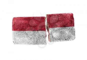 Rough broken brick, isolated on white background, flag of Indonesia