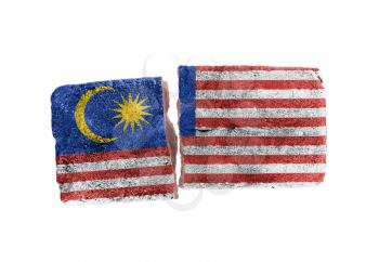 Rough broken brick, isolated on white background, flag of Malaysia