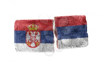 Rough broken brick, isolated on white background, flag of Serbia