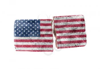 Rough broken brick, isolated on white background, flag of the USA