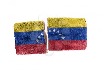Rough broken brick, isolated on white background, flag of Venezuela