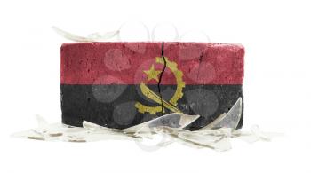 Brick with broken glass, violence concept, flag of Angola