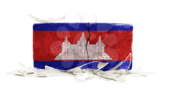 Brick with broken glass, violence concept, flag of Cambodia