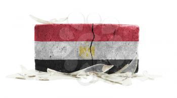 Brick with broken glass, violence concept, flag of Egypt